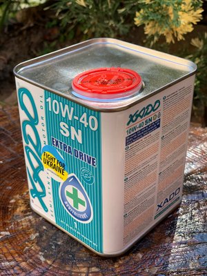 Полусинтетическое масло XADO Atomic Oil 10W-40 SN 1 литр, для мотоциклов ХА 20170 фото